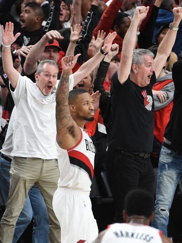 Damian Lillard and fans react after his game-winning buzzer-beater.