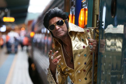 SYDNEY, AUSTRALIA - JANUARY 10: Elvis tribute artist Alfred Kaz, also known as 'Bollywood Elvis' poses at Central Station ahead of boarding the 'Elvis Express' on January 10, 2019 in Sydney, Australia. The Parkes Elvis Festival is held annually over five days, timed to coincide with Elvis Presley's birth date in January. (Photo by Lisa Maree Williams/Getty Images) *** BESTPIX *** ORG XMIT: 688902081 ORIG FILE ID: 1091912780