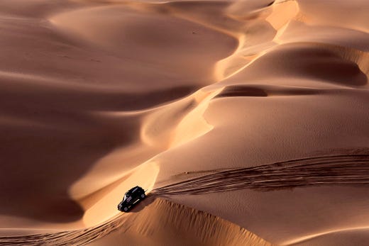 TOPSHOT - Mini's Spanish driver Nani Roma and co-driver Alexandre Haro Bravo compete during the Stage 2 of the Dakar 2019 between Pisco and San Juan de Marcona, Peru, on January 8, 2019. - Peugeot's French driver Sebastien Loeb and co-driver Daniel Elena won the stage. (Photo by FRANCK FIFE / AFP)FRANCK FIFE/AFP/Getty Images ORG XMIT: 41147 ORIG FILE ID: AFP_1C2858