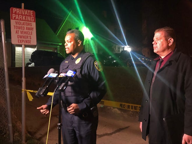 Inspector Jutiki Jackson speaks to media Saturday night near North 13th Street and West Capitol Drive after a police chase and crash. The man fleeing police died when his car crashed into a house and caught on fire, authorities said.