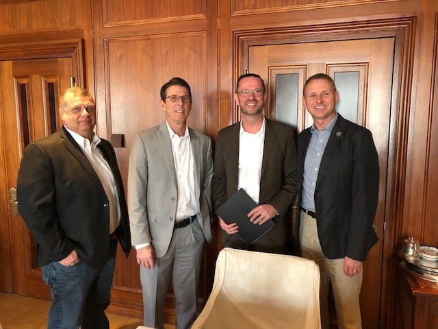 James King (Delaware County Commissioner), Bill Walters (Director of the ECI Regional Planning District),
Thomas Schwegmann (CEO PONS Atlantic Partners in Berlin), and 
Brad Bookout (Director of Municipal and Economic Affairs in Delaware County) take a quick photo during their seven day trip to Germany and the Netherlands.