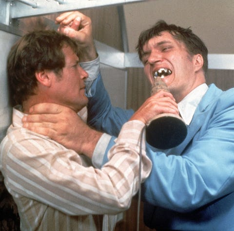 Richard Kiel as Jaws and Roger Moore as James...