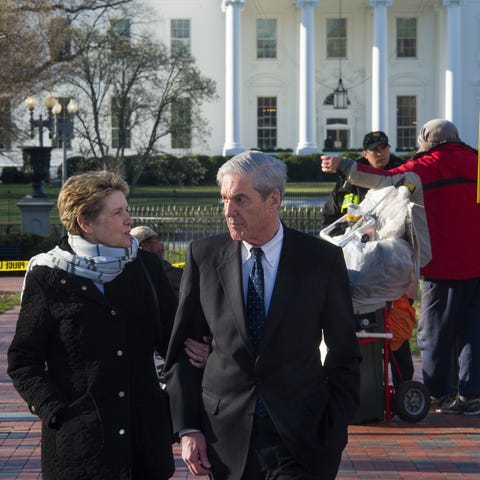 Special Counsel Robert Mueller, and his wife Ann,...
