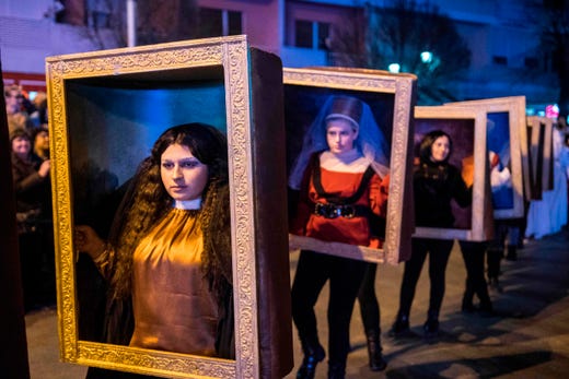 Costumed revelers perform in a carnival procession on the streets of Strumica, Macedonia, during the great evening carnival on March 9, 2019. The renowned carnival, which marks the beginning of the Christian Orthodox Lent, attracted hundreds of participants and tens of thousands of visitors in Strumica. 