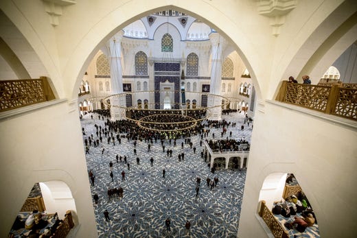 People wait to take part in the first official public prayer marking the opening of Camlica Mosque on March 7, 2019 in Istanbul, Turkey. Camlica Mosque is now Turkey's largest mosque capable of accommodating more than 40,000 people. The mosque sits on Camlica hill with sweeping views over Istanbul. Construction on the mega project, which was championed by Turkey's president Recep Tayyip Erdogan, started in 2013 at a cost of approximately 150 million Turkish Lira. The mosque was designed by two female architects and includes a museum, art gallery and library.