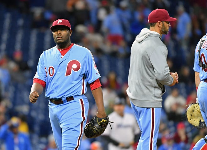 Apr 25, 2019; Philadelphia, PA, USA; Philadelphia Phillies relief pitcher Hector Neris (50) walks off the field against the Miami Marlins after giving up a two run home run during the 10th inning at Citizens Bank Park. Mandatory Credit: Eric Hartline-USA TODAY Sports