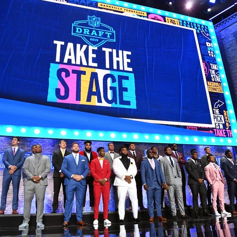 NFL prospects on stage prior to the first round of