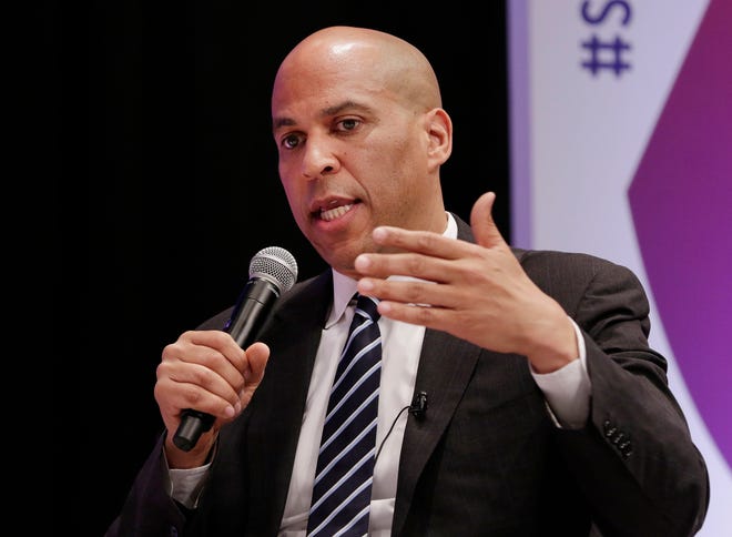 Democratic presidential candidate Sen. Cory Booker, D-N.J., answers questions during a presidential forum held by She The People on the Texas State University campus Wednesday, April 24, 2019, in Houston.