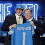 Iowa tight end T.J. Hockenson poses with NFL Commissioner Roger Goodell after being selected by the Lions with the No. 8 pick.