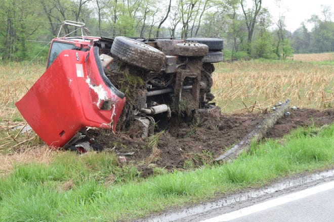 No one was injured after this dump truck overturned on Cincinnati-Zanesville Road April 26, 2019.