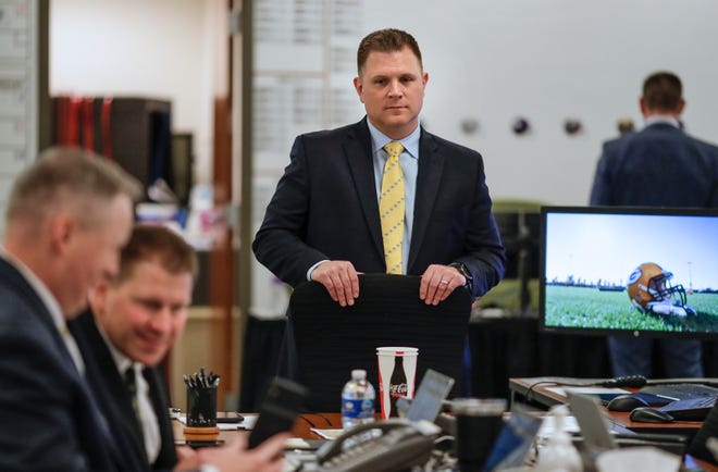 Green Bay Packers general manager Brian Gutekunst oversees the team's draft room Thursday night at Lambeau Field in Green Bay.