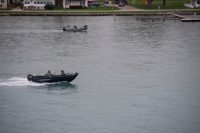 Fishing boats are seen on the St. Clair River near Algonac Thursday, April 25, 2019.