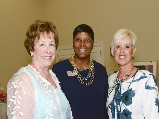 Yolanda Sheppard with Celebrity Cruises, center, with Blue Ribbon Luncheon & Fashion Show Co-Chairs Sue Sharpe, left, and Diane Wilhelm.