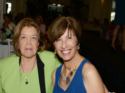 Guild President Henriette Churney and Eva Rivero at the 20th Anniversary Blue Ribbon Luncheon & Fashion Show at Oak Harbor    Club in Vero Beach.