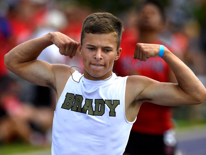 Jack Marshall of Brady flexes after winning the boy's 200 meter dash during Saturday's Region 1-3A track meet at Abilene Christian University April 27, 2019.