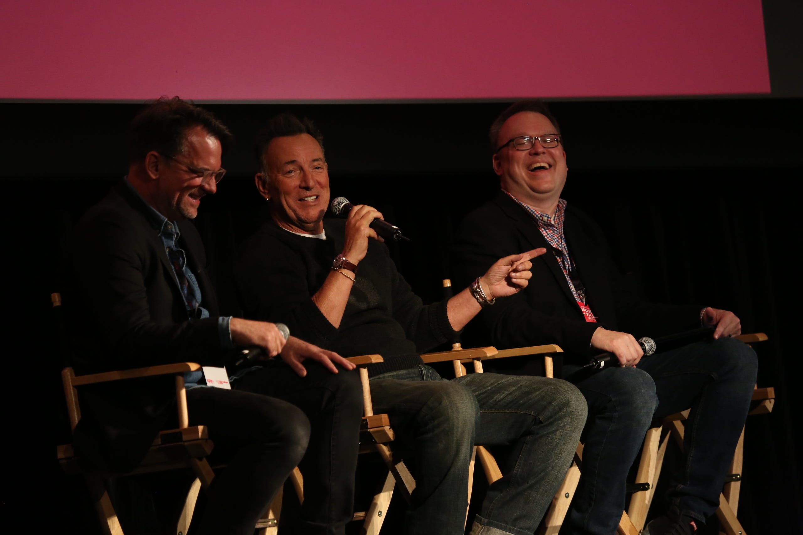 Thom Zimny [L-R), Bruce Springsteen and Chris Phillips on the stage of the Paramount Theatre in Asbury Park as part of the APMFF.