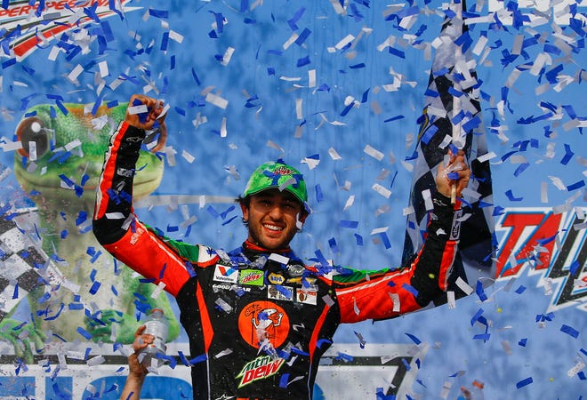 Chase Elliott celebrates after winning at Talladega Superspeedway on Sunday.