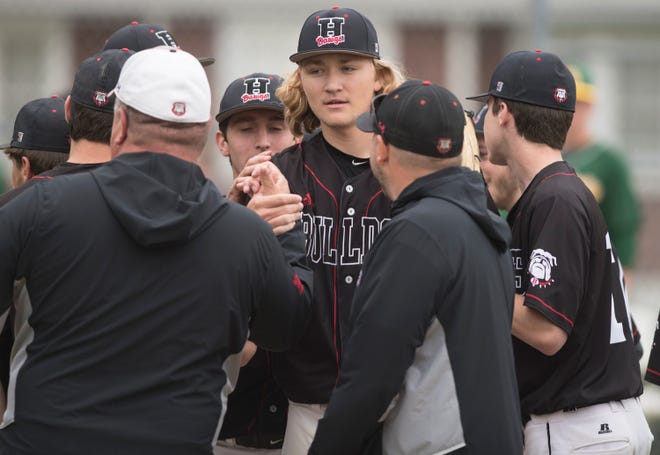 Haddonfield's Dylan Heine, center, celebrates with teammates and coaches after Haddonfield defeated Audubon, 2-0, on Monday, April 29, 2019 at Audubon High School.  Heine threw a complete-game shutout in Haddonfield's victory over Audubon.