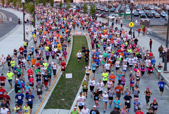 A total of 33,852 started in the 15th annual running of the Flying Pig Marathon on Sunday, May 5, 2013. They started along Mehring Way near Paul Brown Stadium.