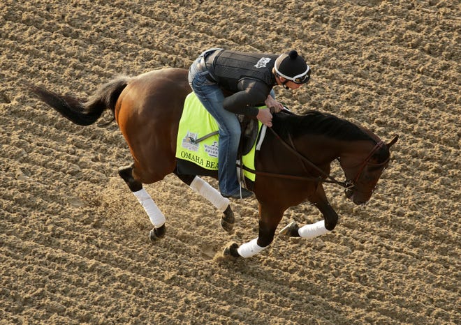 Kentucky Derby favorite Omaha Beach was scratched due Wednesday to a breathing problem.