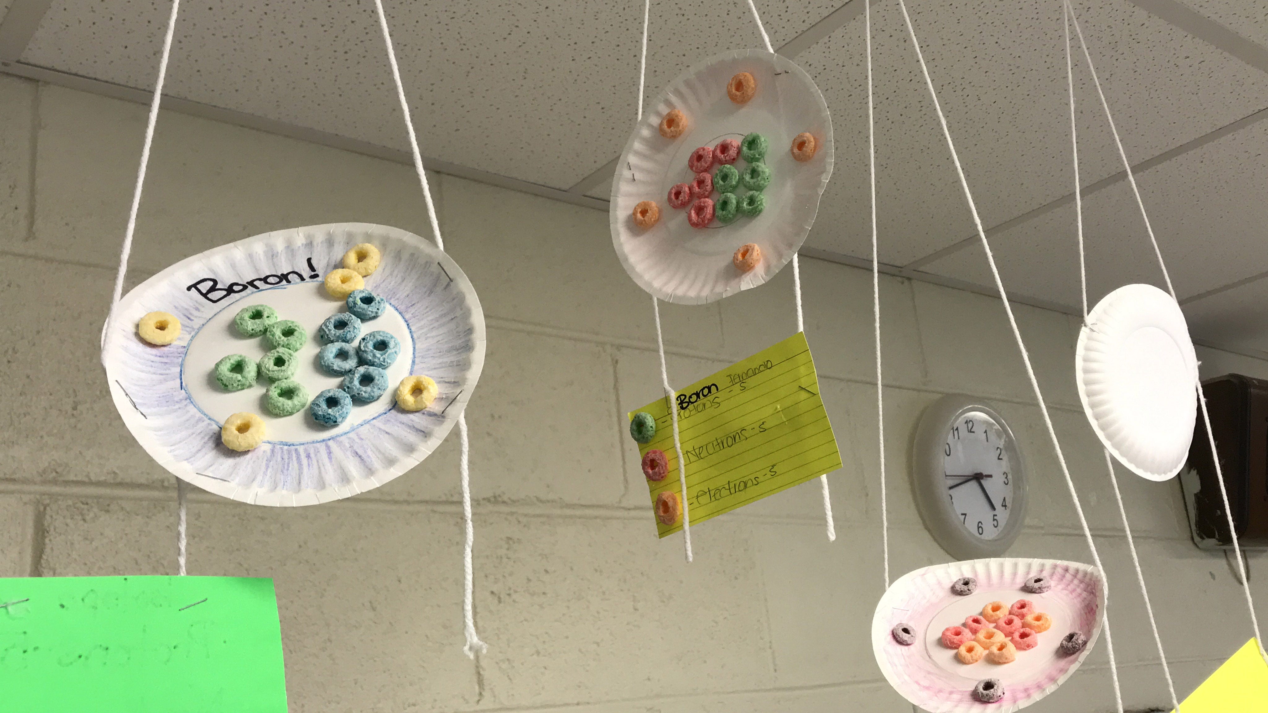 AP Chemistry student illustrations of Boron, a chemical element, hang in a classroom at Holmes County Central High School. Tuesday, April 9, 2019.