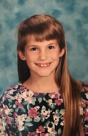 Up until she was in third grade, Jessica Pucci's mother kept her in bangs cut back over her ears.