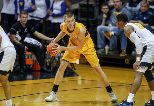 Valparaiso Crusaders center Derrik Smits (21) pauses with the ball during the second half against the West Virginia Mountaineers at WVU Coliseum. Smits has transferred to Butler. Ben Queen-USA TODAY Sports