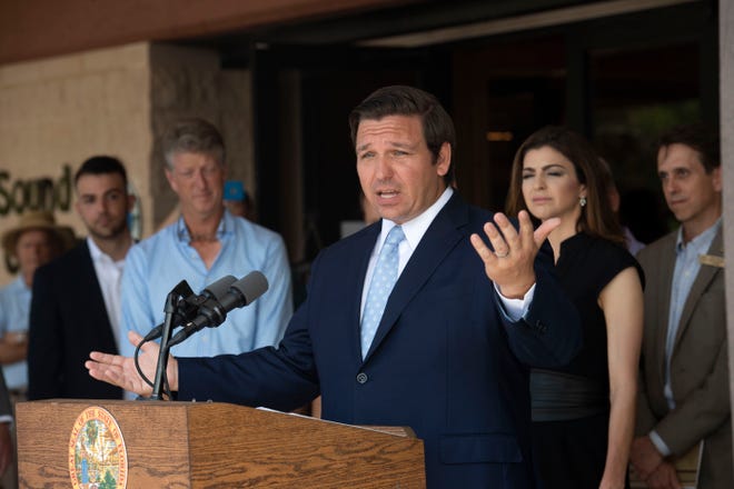 Gov. Ron DeSantis and Secretary of the Florida Department of Environmental Protection Noah Valenstein announce a Blue-Green Algae Task Force during a news conference Monday, April 29, 2019, at the Nathaniel P. Reed Hobe Sound National Wildlife Refuge in Hobe Sound. The team will consist of leaders at Florida universities and marine organizations, including Evelyn Gaiser, Wendy Graham, Valerie J. Paul, Mike Parks and James Sullivan. "The focus of this task force is to support key funding and restoration initiatives and make recommendations to expedite nutrient reductions in Lake Okeechobee and downstream estuaries," DeSantis said.