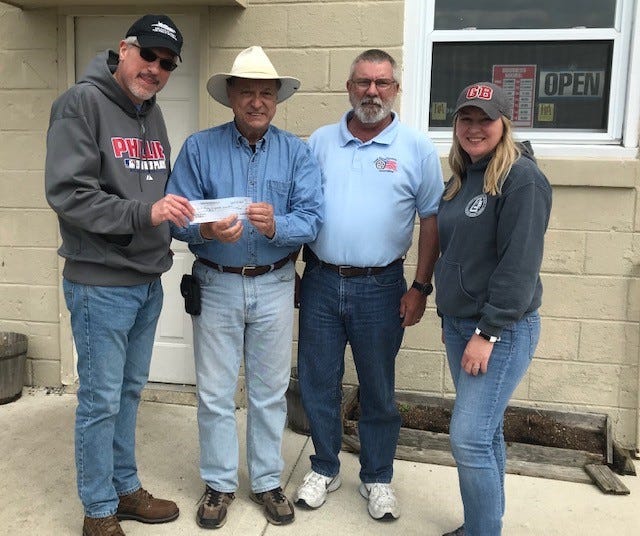 The South Jersey Cruisers Association Car Club recently held its Brews and Cruise Car Cruise at the Glasstown Brewery in Millville. The Millville Army Air Field Museum was the beneficiary of donations from participants and from Glasstown Brewery. A check representing the donations was presented at the conclusion of the event. (From left) Robert Trivellini, accepts the donation from Ben Notaro, spokesman, South Jersey Cruisers Association Car Club, Bill VonSuskill cruise coordinator, and Jennifer Sammons; co-owner, Glasstown Brewery.