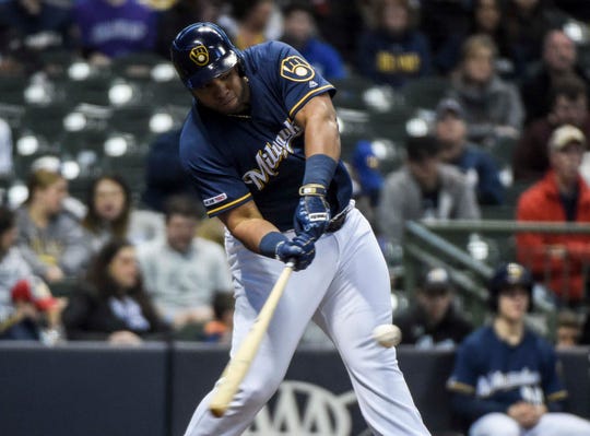 The first baseman of the Brewers, Jesus Aguilar, scored a run with three points in the first run on Monday night.
