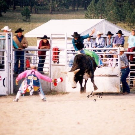 Halverson rides a bull during a rodeo in 1997. He competed in the sport during and after he was in the Army.