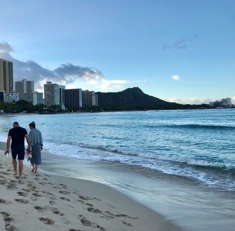 Sunrise at iconic Waikiki Beach, with Diamond...