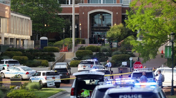 Police keep the campus on lockdown after a...