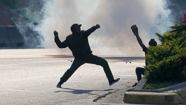 Opponents to Venezuela's President Nicolas Maduro...