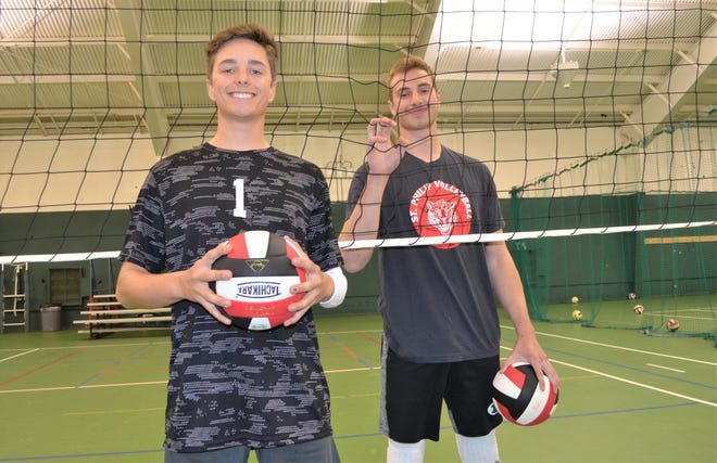 A Battle Creek team, which includes seniors, from left, Sam Mateer of Harper Creek and Sam Krauss of Pennfield, is among a group of 12 squads across the state playing high school boys volleyball in the Michigan Boys Volleyball Conference. The group is hoping in the near future boys volleyball become an official MHSAA sport.