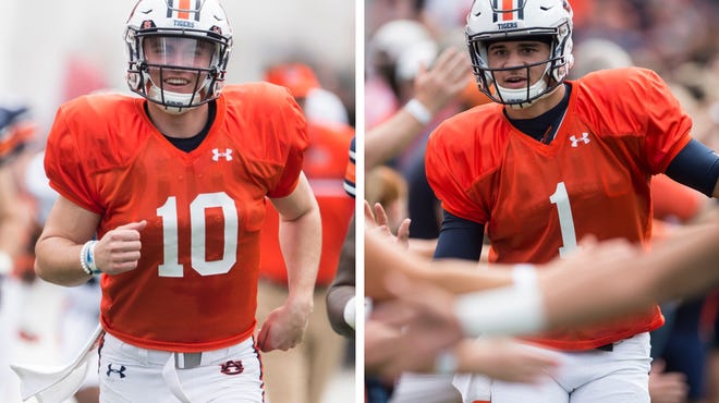 Auburn quarterbacks Bo Nix (left) and Joey Gatewood (right) take the field before A-Day on Saturday, April 13, 2019.