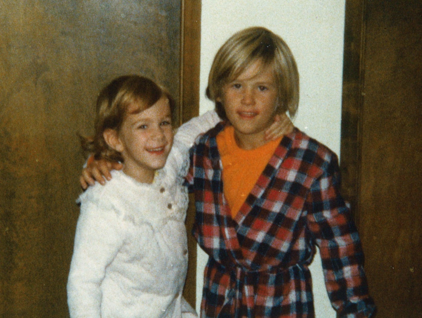 Halverson, around 6 in this photo with little sister Tiffeny, grew up in Salem.