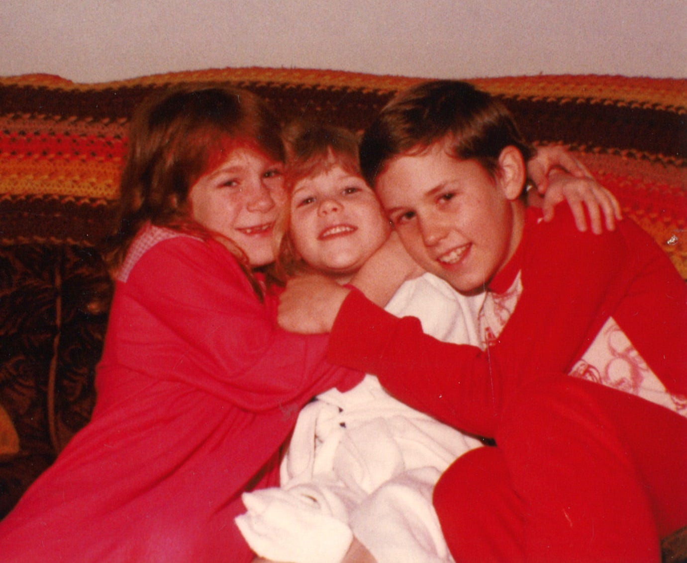 Halverson with younger sisters Tiffeny and Desiree in the early 1980s at their home in Salem.