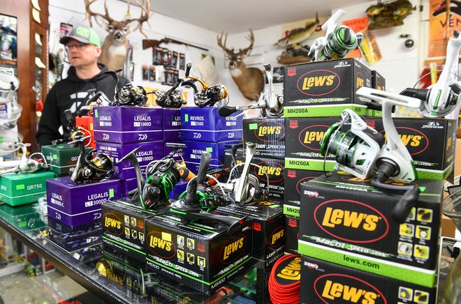 Stoplight Bait owner Aaron Kreller talks about about how busy his shop gets around the Minnesota fishing opener during an interview Tuesday, April 30, at the St. Cloud business. 