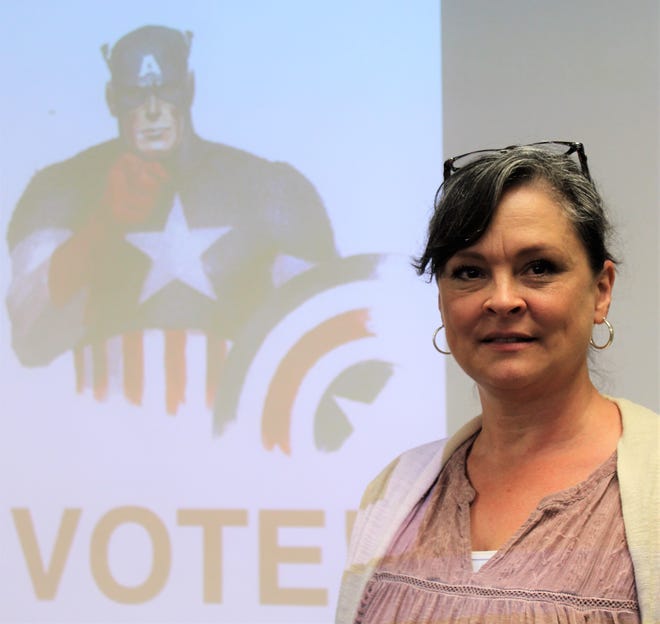 Like Captain America, Taylor County election judge Lara Carlin urges residents to exercise their right to vote.