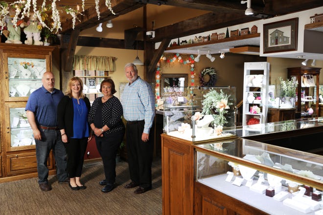 Greg and Kathy Fisher and their daughter Alison Flinner and son-in-law Jeff operate House of G.A. Fisher Jewelers in Roscoe Village. Alison represents the third generation of jewelers in the Fisher family.