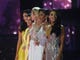 Miss Oklahoma Triana Browne, right, along with other contestants compete during Miss USA 2019.