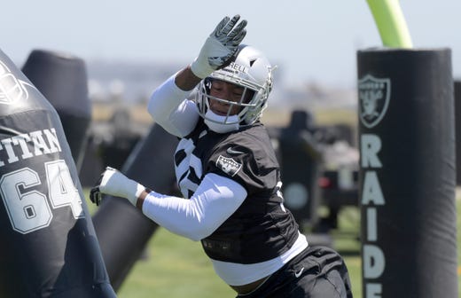 Oakland Raiders defensive end Clelin Ferrell performs a drill during rookie minicamp at the Raiders practice facility.