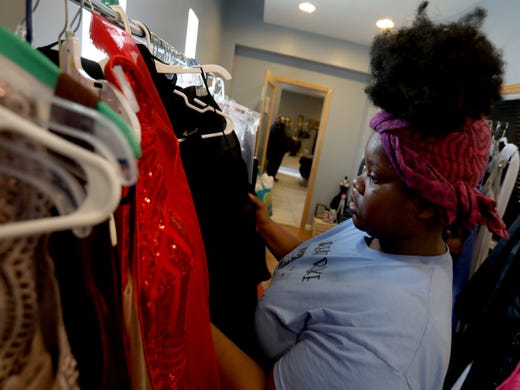 Danielle Holmes and an eighth grader at Laurus Academy came to Superbad Boxing Gym in Detroit on Saturday, May 4, 2019 to look for a nice prom and graduation dress during the first annual Prom Dress Giveaway at the gym.