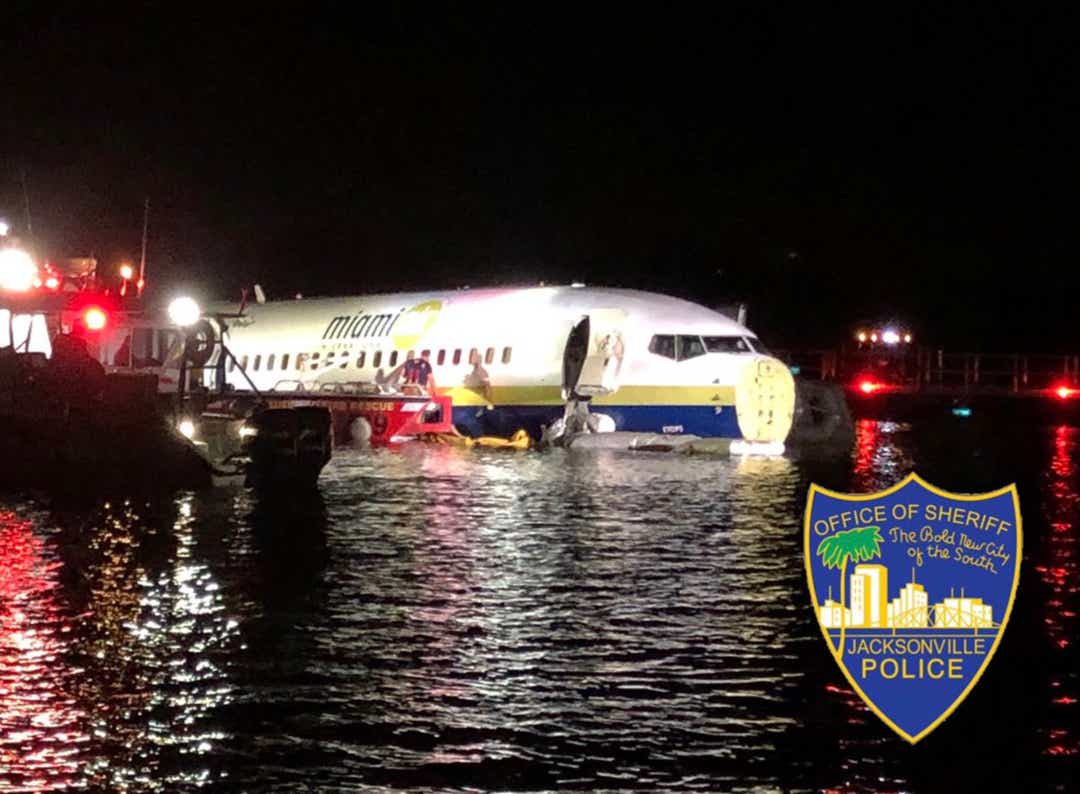 IMG BOEING 737 Skids off Runway into Florida River