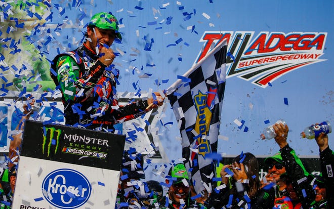 Chase Elliott, left, celebrates after winning a NASCAR Cup Series race at Talladega Superspeedway, Sunday, April 28, 2019, in Talladega, Ala.