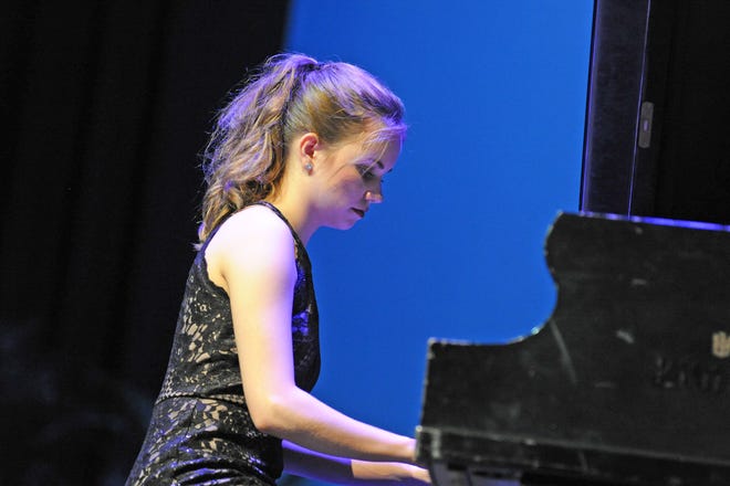 Ivy Snyder, a student at Spring Grove Area High School, performs on the piano for the 2019 Distinguished Young Women of York County competition. Snyder won first place.