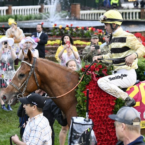 Flavien Prat aboard Country House (20) in the...