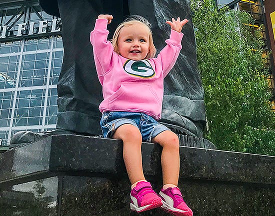 Trisha Brown's photo of her granddaughter at Lambeau Field won the Green Bay Packers' Ticket Takeover contest for 2019.
