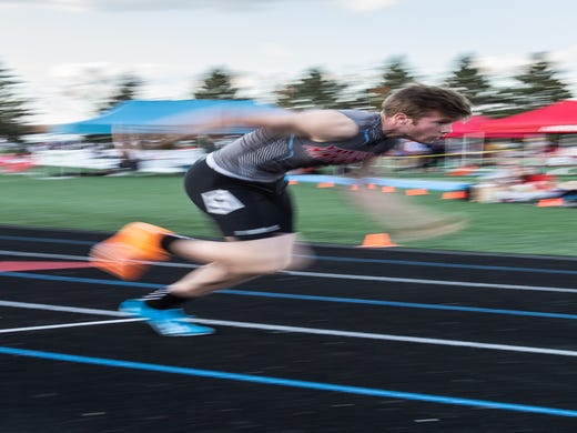 Arrowhead senior Christian Peterson launches off the starting blocks for the 400 meter dash at the 2019 Myrhum Invitational track and field meet in Hartland on Saturday, May 4.